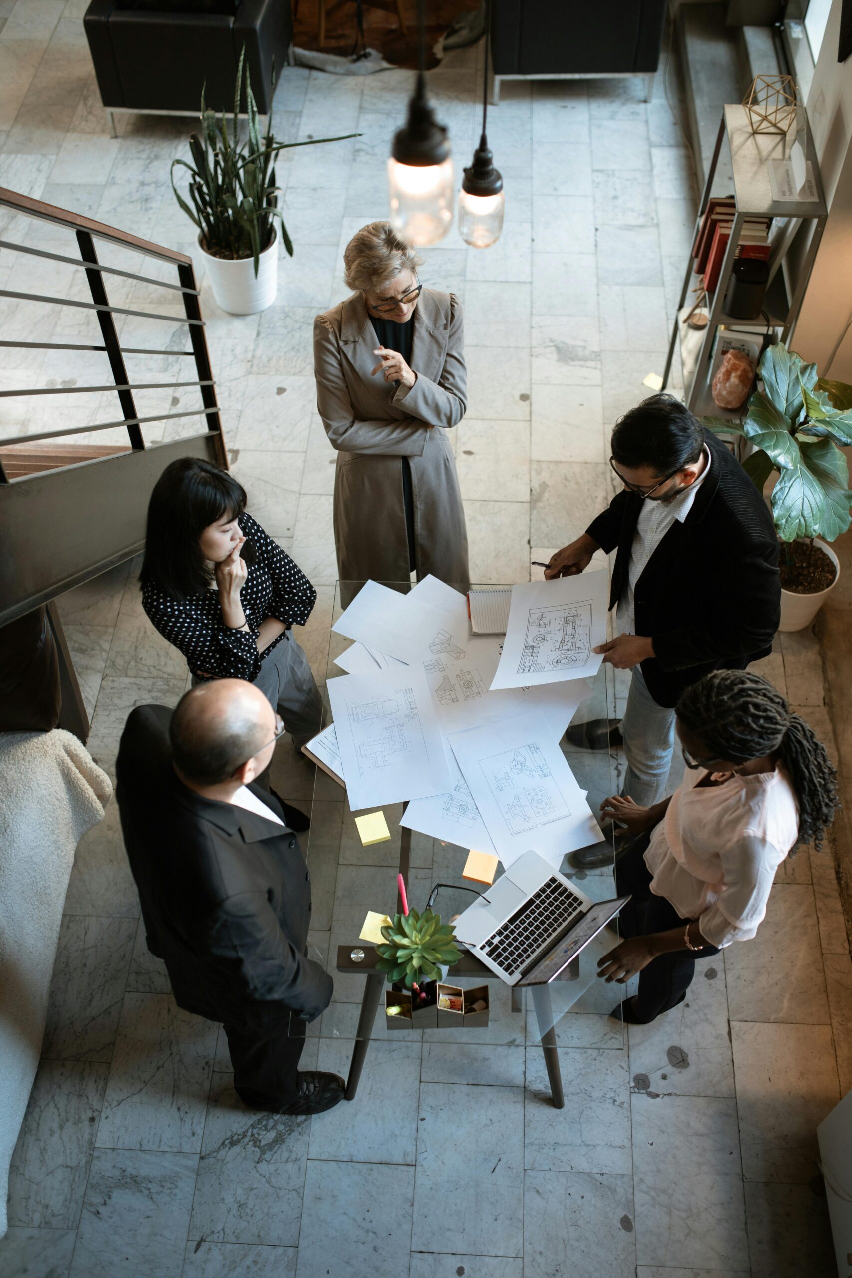 Fort Worth real estate agent reviewing a marketing plan with a local agency
